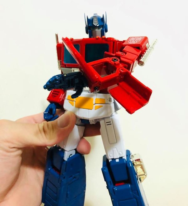 mp-44-optimus-prime-first-in-hand-images