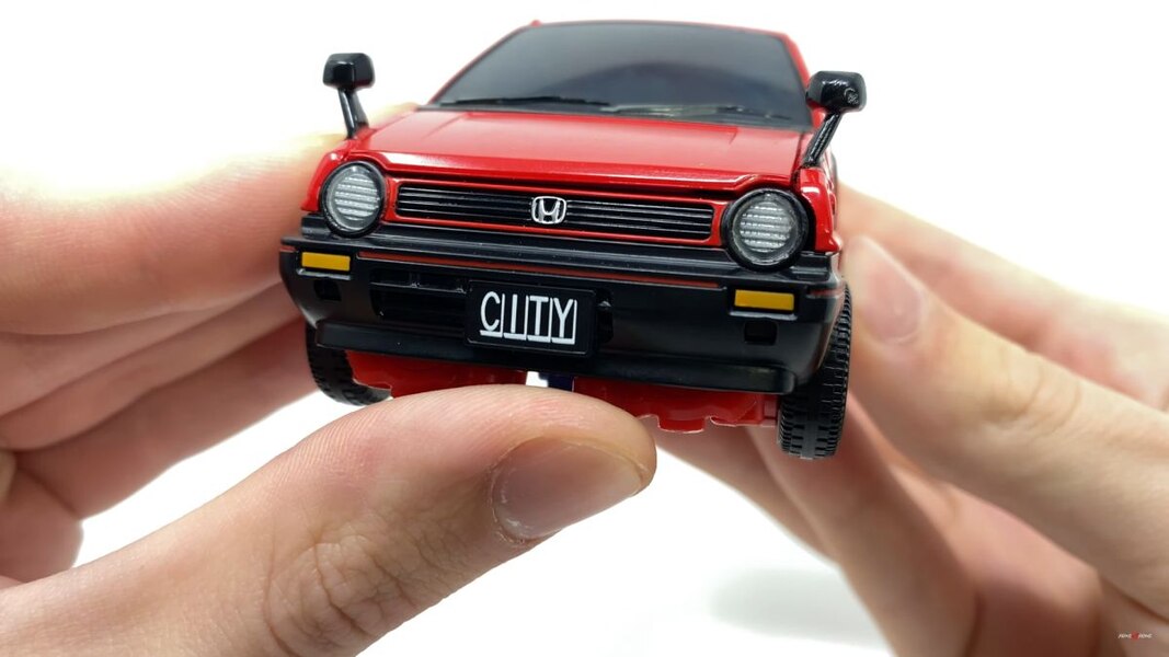 Transformers Masterpiece MP-54 Reboost Red Honda City Turbo In-Hand Images