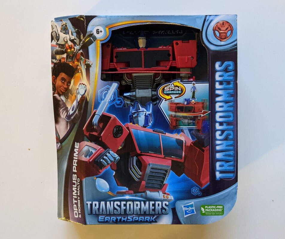 Transformers Earthspark Spin Changer Optimus Prime In-Hand Box Images