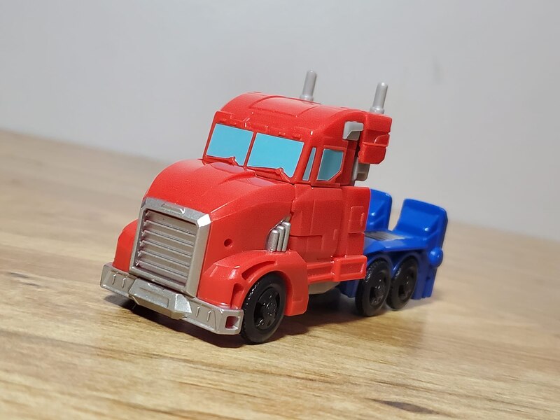 In Hand Image Of Transformers Earthspark Warrior Optimus And Deluxe Megatron  (5 of 12)