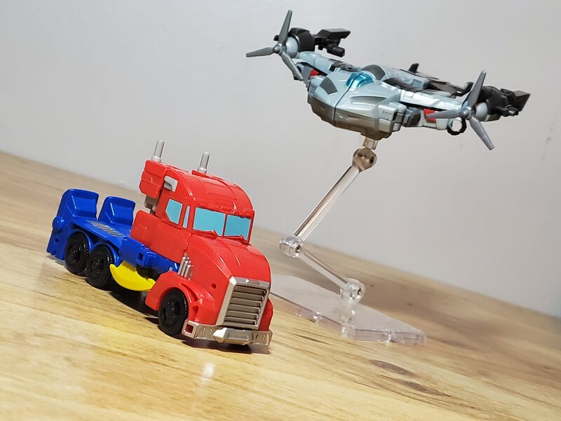 In Hand Image Of Transformers Earthspark Warrior Optimus And Deluxe Megatron  (12 of 12)