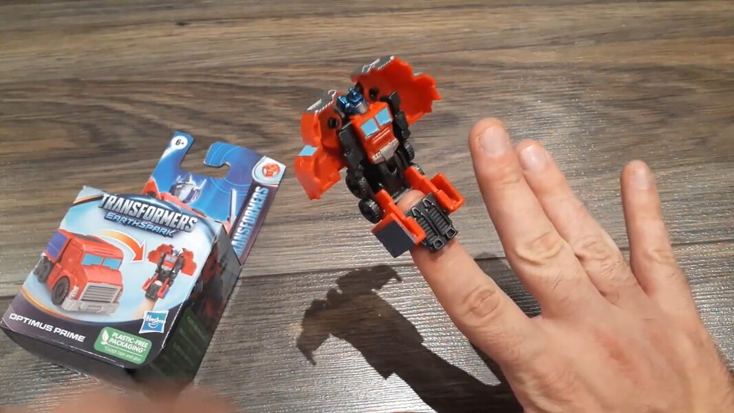 In Hand Image Of Transformers EarthSpark Tacticon Wave1 Optimus Prime  (5 of 6)