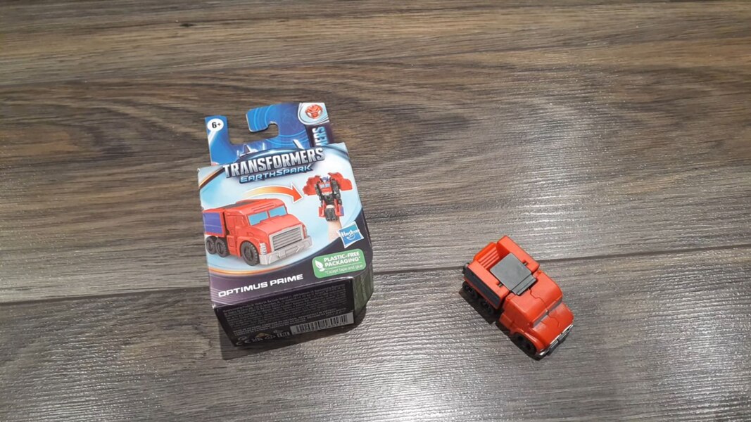 In Hand Image Of Transformers EarthSpark Tacticon Wave1 Optimus Prime  (6 of 6)