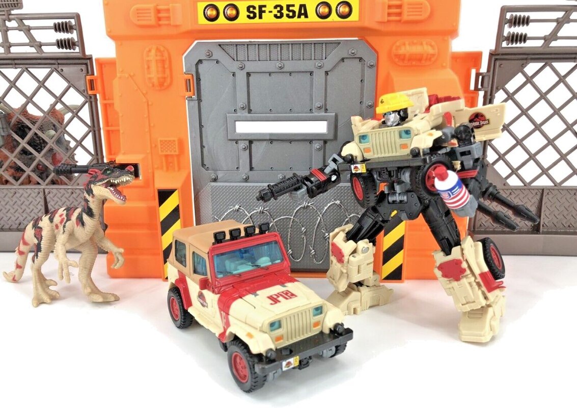 Autobot JP12 Dennis Nedry In-Hand Images from Transformers x Jurassic Park Collaborative